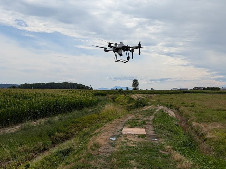 Agras t-25 spray drone taking off